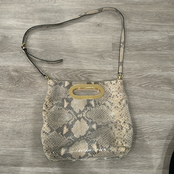 Michael Kors snakeskin cowboy bag with magnetic closure - Picture 10 of 10